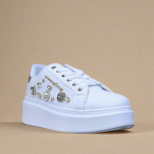 Fashion-forward white platform sneakers embellished with gems and lace-up closure by Sissy Boy