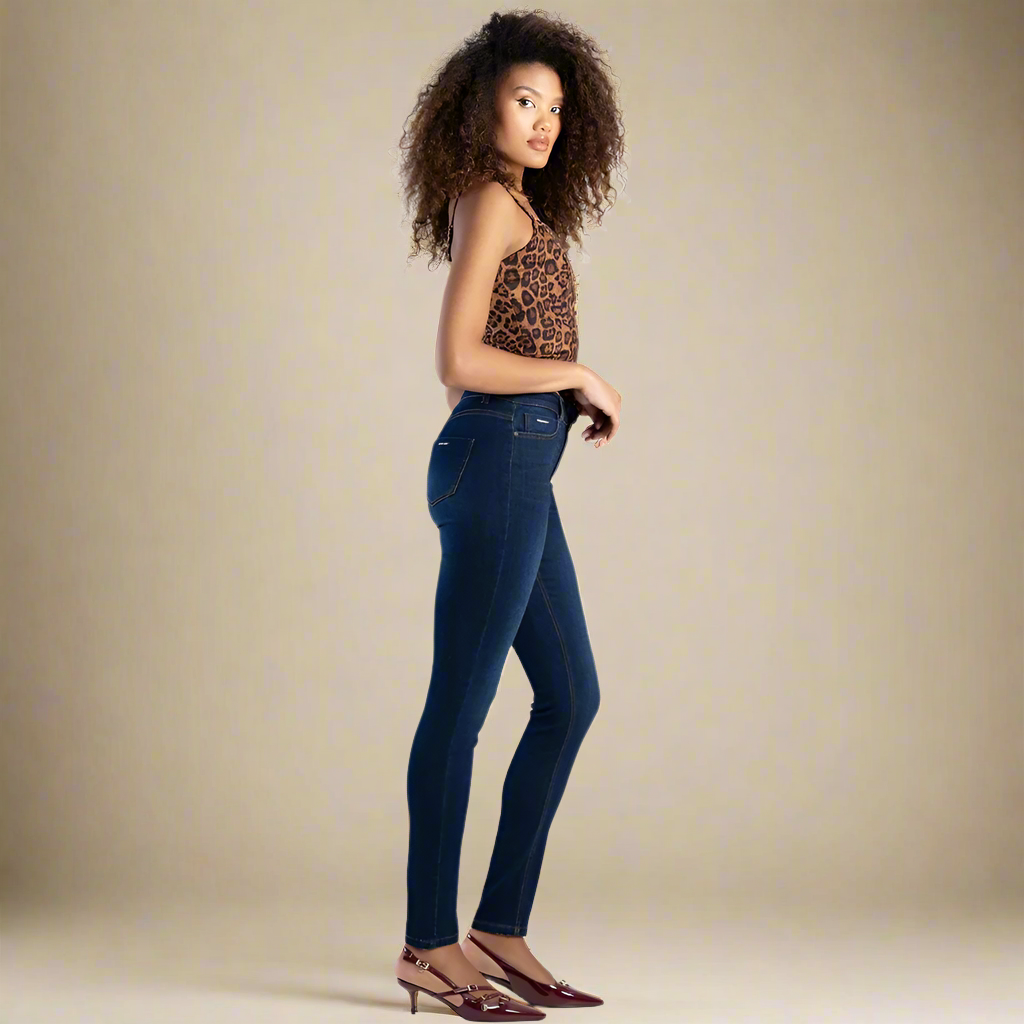 Lightweight dark blue skinny jeans with zip fly closure and mid-rise fit by Sissy Boy.