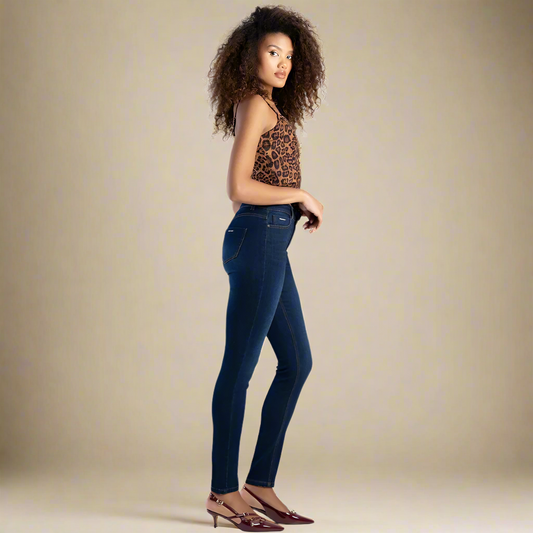 Lightweight dark blue skinny jeans with zip fly closure and mid-rise fit by Sissy Boy.