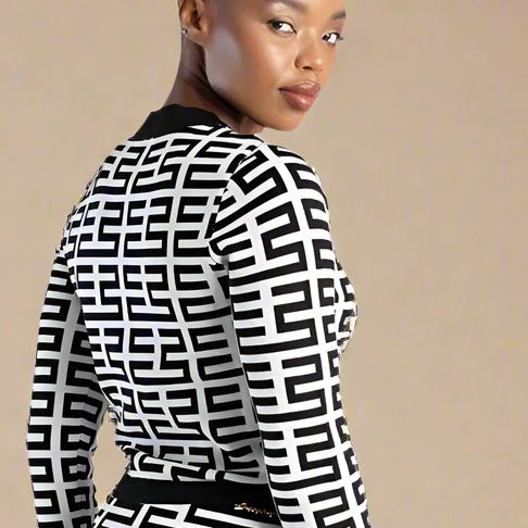 Stylish black-and-white geometric knit cardigan and skirt ensemble for chic women’s fashion