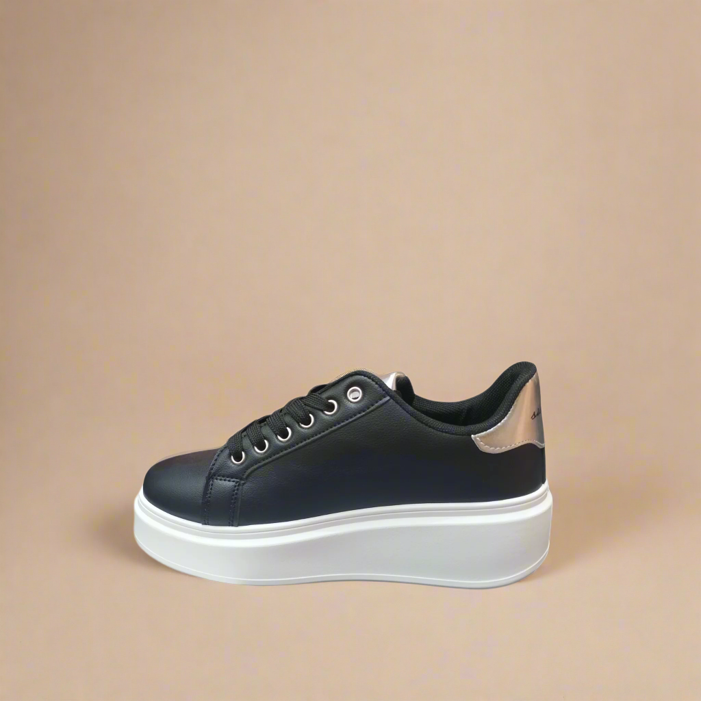 Fashionable black platform sneakers with chunky white sole from Sissy Boy