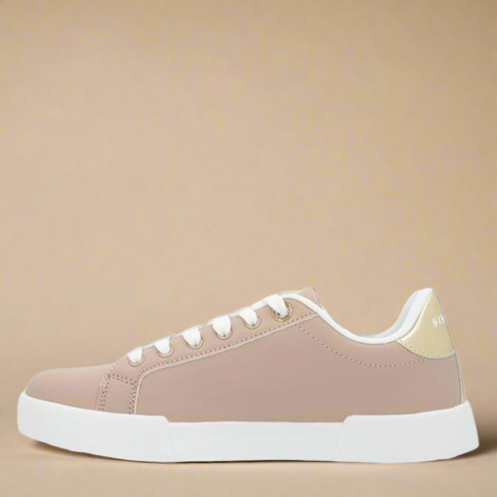 Beige sneaker with white sole on a light beige background