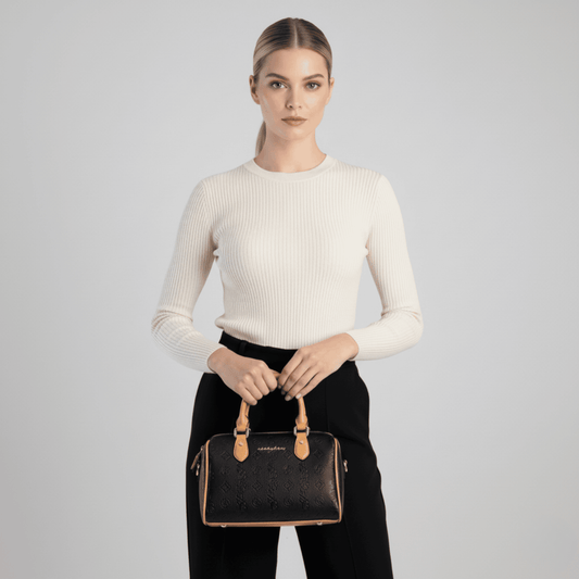 Stylish Sissy Boy black handbag with embossed logo pattern and detachable strap