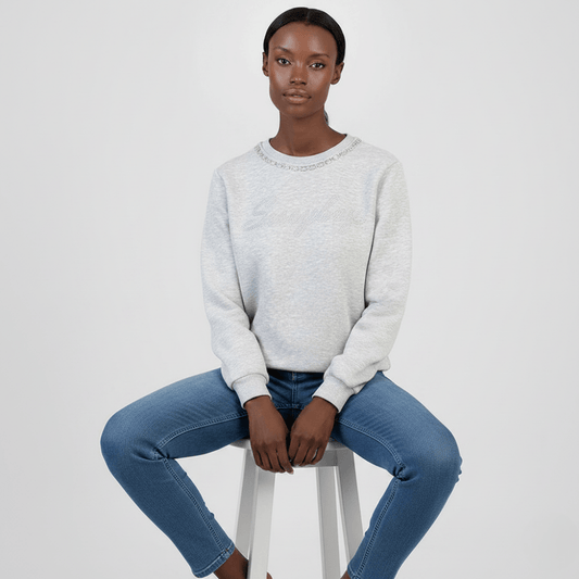 Women’s grey knit sweatshirt with subtle logo detail