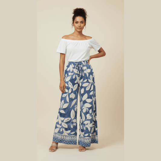 Modern Dynasty Mellow Wave Wide Leg Pants in blue and white leaf print with tie waist and wide-leg fit