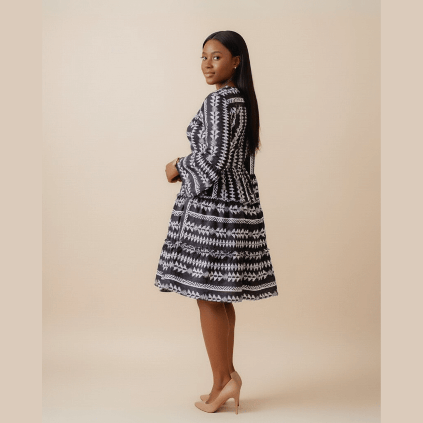 Women's summer black and white boho midi dress, v-neck and flowy silhouette