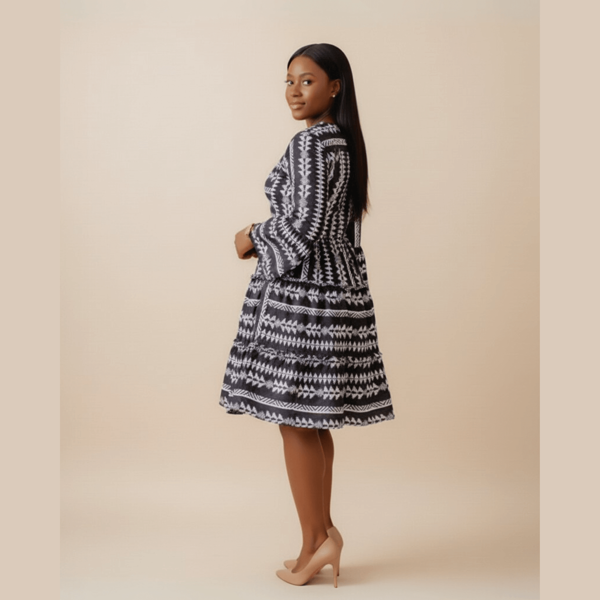 Women's summer black and white boho midi dress, v-neck and flowy silhouette
