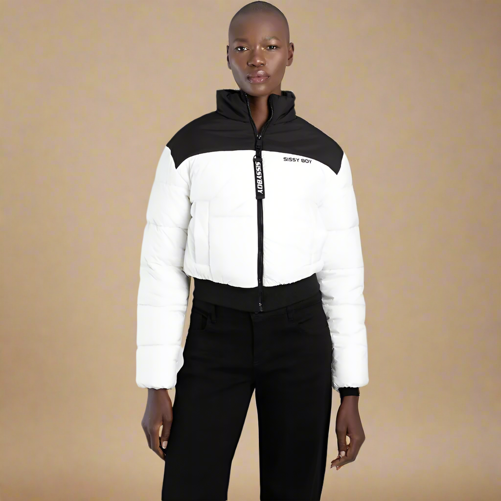 Sissy Boy black and white cropped puffer jacket with bold branding on the chest and zipper, perfect for stylish winter wear.