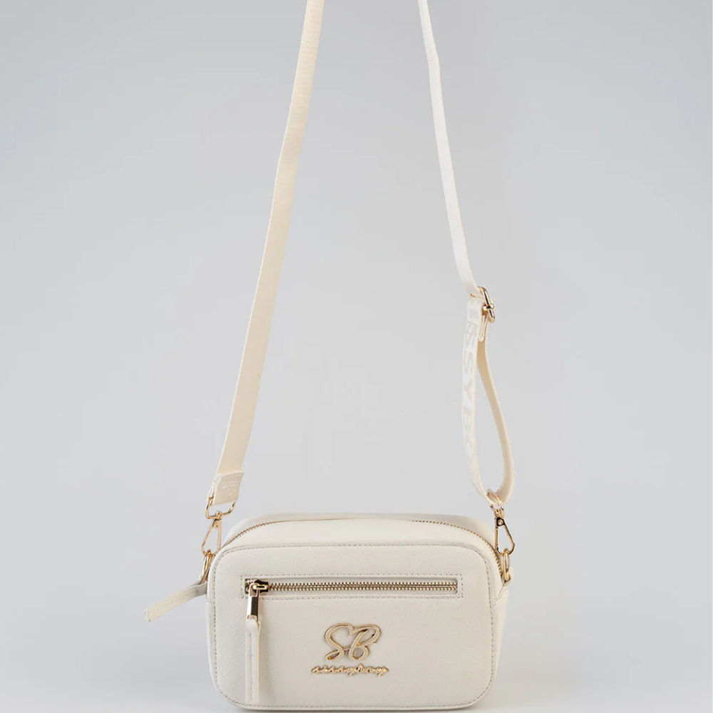 Women’s cream crossbody bag by Sissy Boy with gold hardware