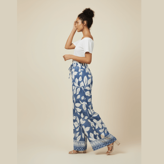 Women’s blue and white wide leg pants with leaf print and patterned hem – Modern Dynasty