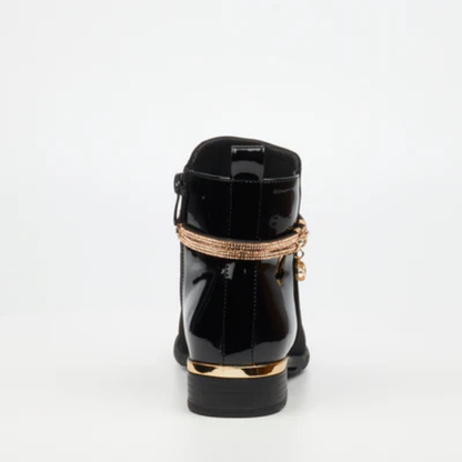 Close-up of Miss Black Hadar 20 ankle boot showing faux patent and nubuck texture