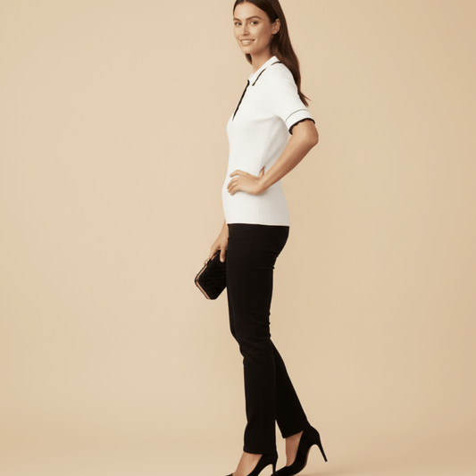 Women’s white ribbed knit golf shirt with gold button detail