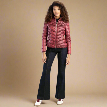 Elegant Sissy Boy quilted puffer jacket in deep burgundy, combining comfort and practicality for winter fashion.