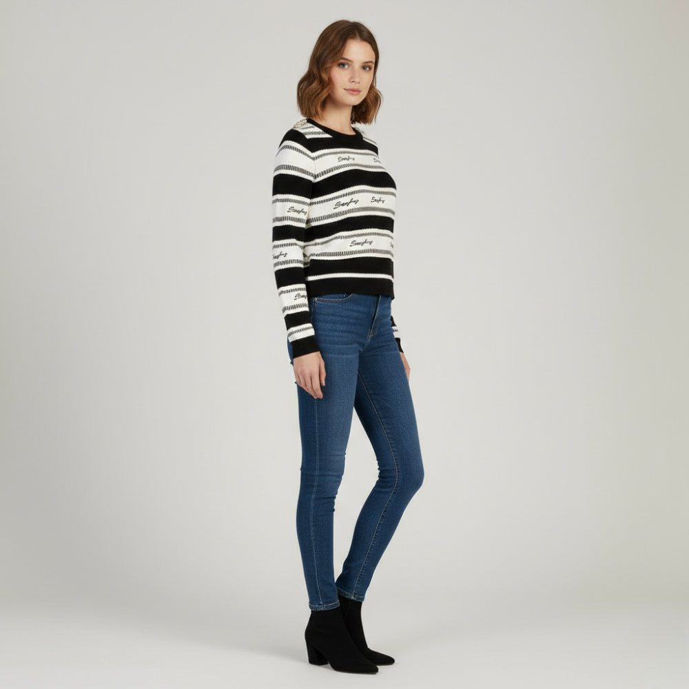 Sissy Boy logo knit sweater styled with denim jeans