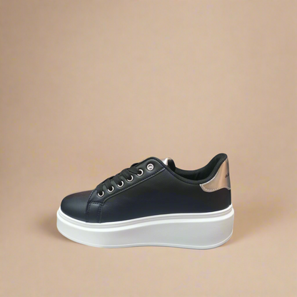 Fashionable black platform sneakers with chunky white sole from Sissy Boy