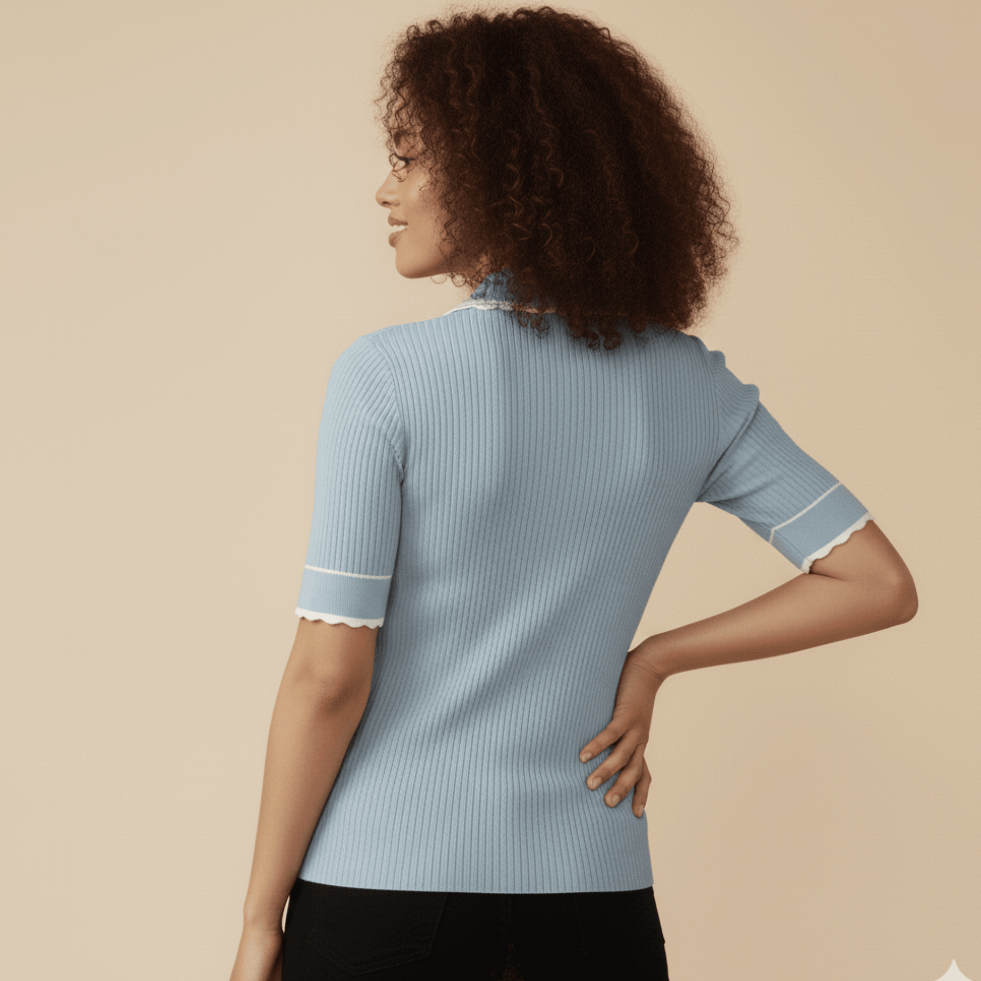 Soft pastel blue knit top with gold button detail