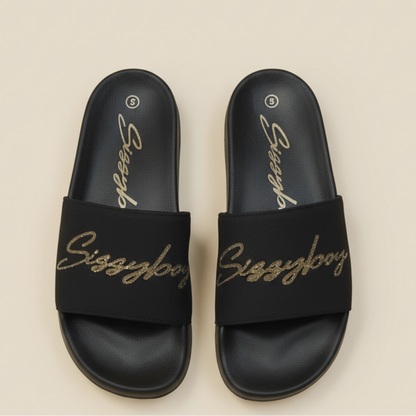 Sissy Boy slides featuring gold cursive branding on wide straps.