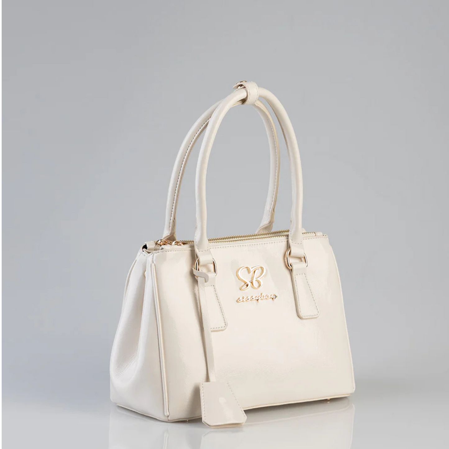 Jacky Shoulder Bag by Sissy Boy – cream handbag with spacious compartments and gold trims