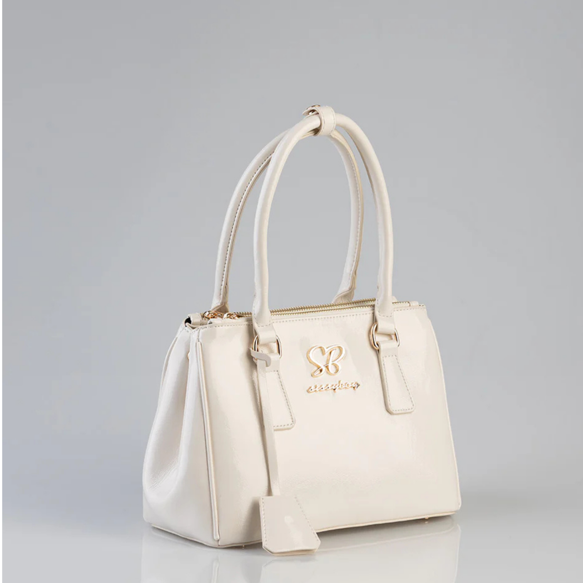 Jacky Shoulder Bag by Sissy Boy – cream handbag with spacious compartments and gold trims