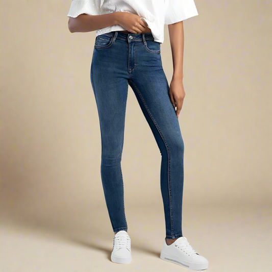 Sissy Boy Mila Rose medium stone blue  skinny jeans with mid-rise fit and embroidered back pockets.