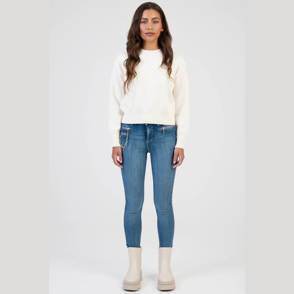 Cream ribbed hem knit sweater minimal fashion look