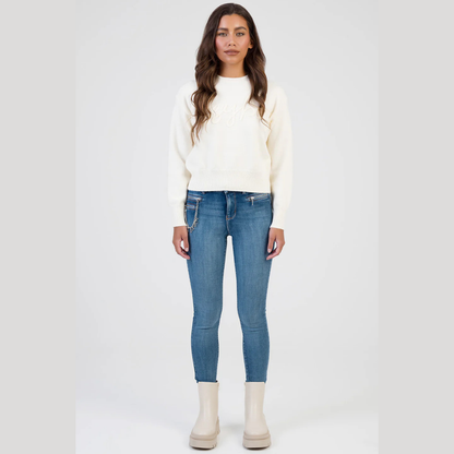 Cream ribbed hem knit sweater minimal fashion look