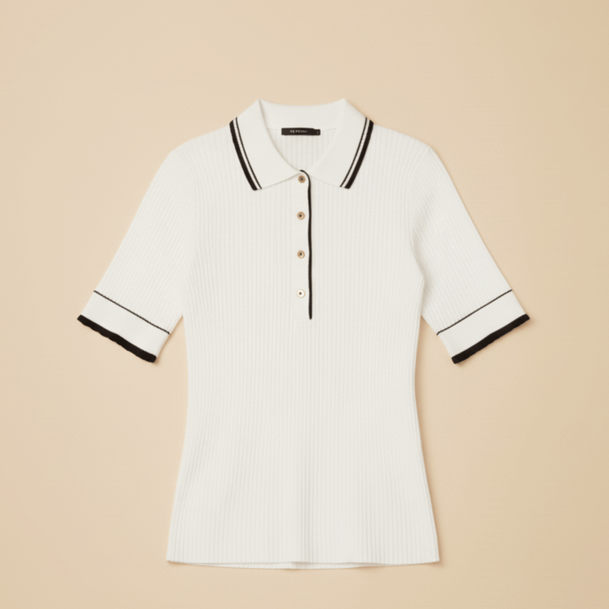 Elegant white polo-style knit shirt with black edges