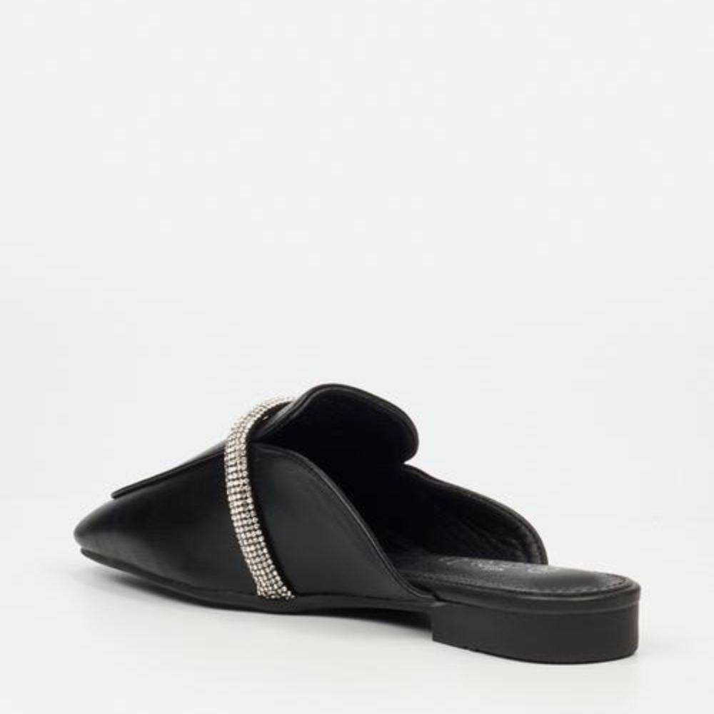 A comfortable and chic mule with a modern twist, adorned with a rhinestone detail.