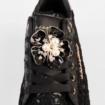 Sissy Boy Yvette black lace-up platform sneaker with decorative charms