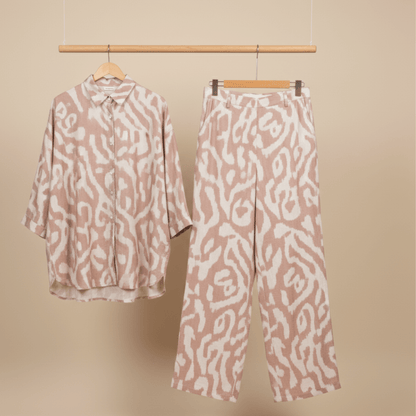 Beige printed two-piece pant set on hanger