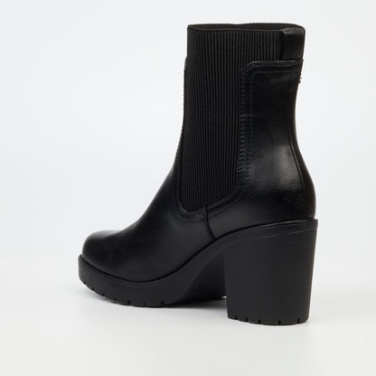 Black slip-on boots with comfort sock and 5.5 cm heel by Butterfly Feet.