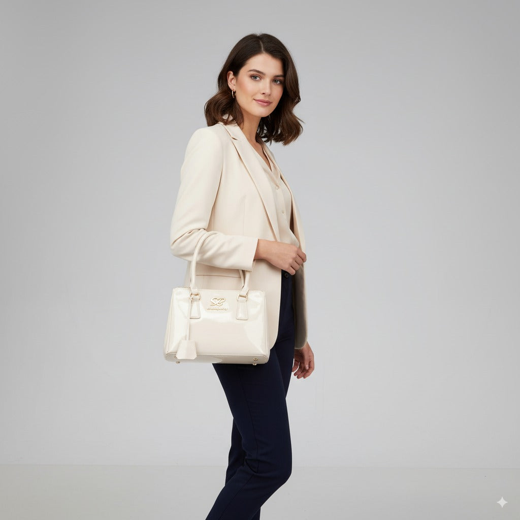 Sissy Boy designer handbag – Jacky Shoulder Bag in glossy cream finish with gold hardware