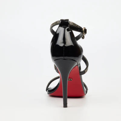 Elegant black glamour heel for women with faux patent finish, buckle ankle strap and diamante detailing