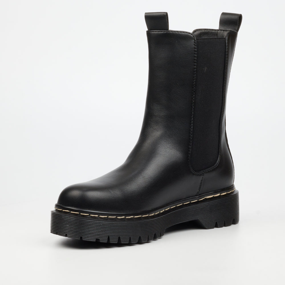 Stylish black women’s ankle boot with thick tread sole and round toe