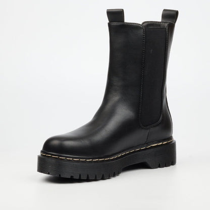 Stylish black women’s ankle boot with thick tread sole and round toe