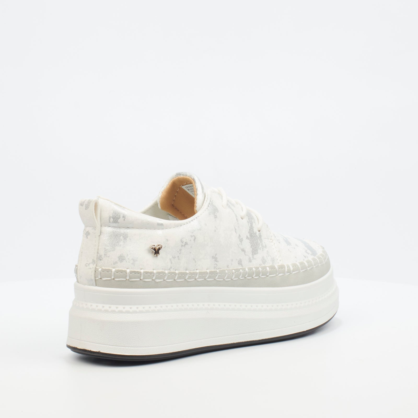 Fashion-forward white sneaker with platform sole and subtle butterfly logo, ideal for versatile everyday wear.