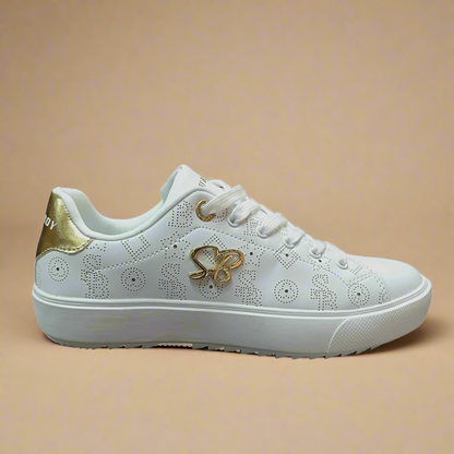 White Penny sneaker by Sissy Boy with gold accents and perforated SB pattern