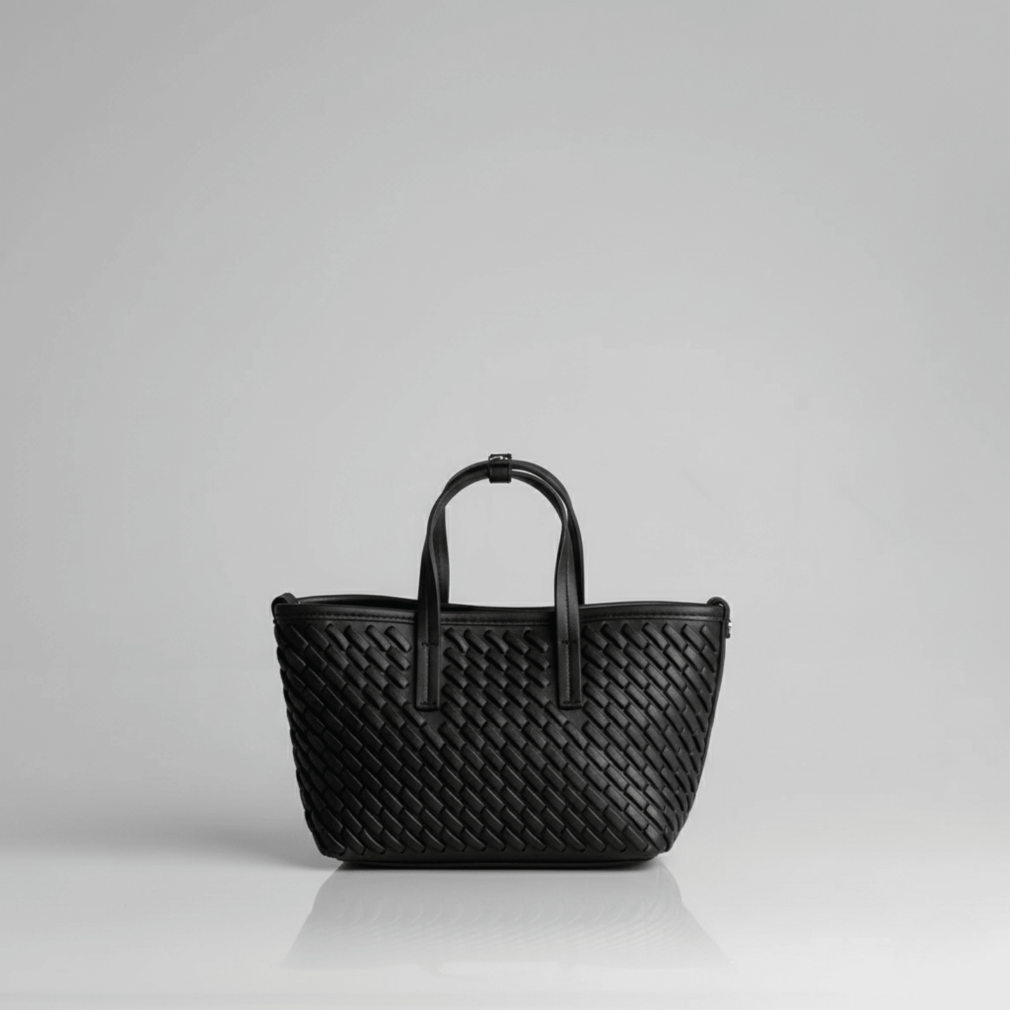 Elegant textured black mini tote for women by Sissy Boy, ideal for casual or formal wear