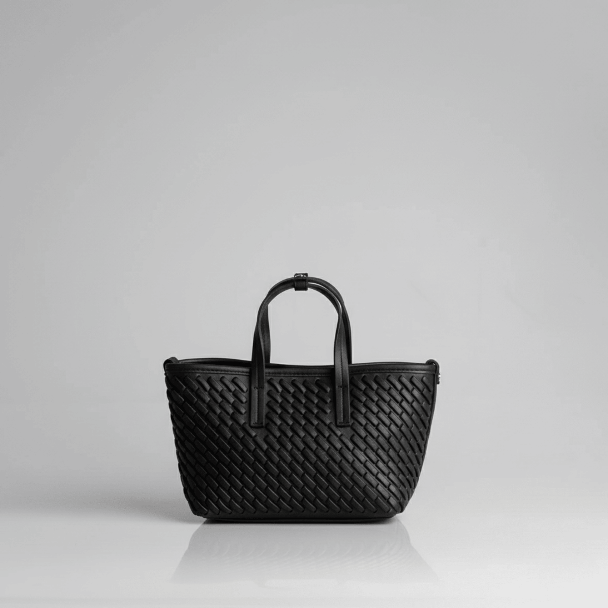 Elegant textured black mini tote for women by Sissy Boy, ideal for casual or formal wear