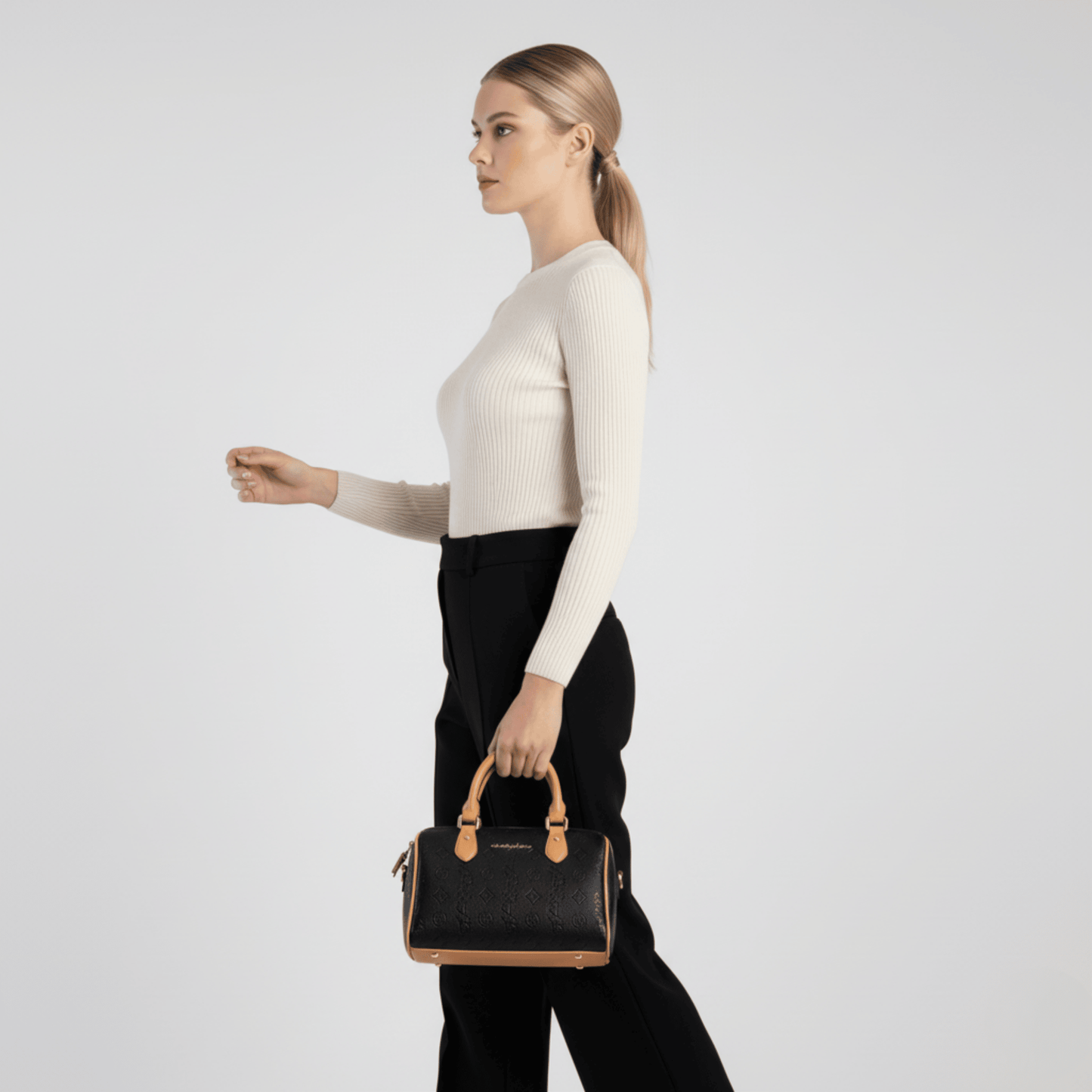 Luxury Sissy Boy women’s handbag with top zip closure and gold-tone accents