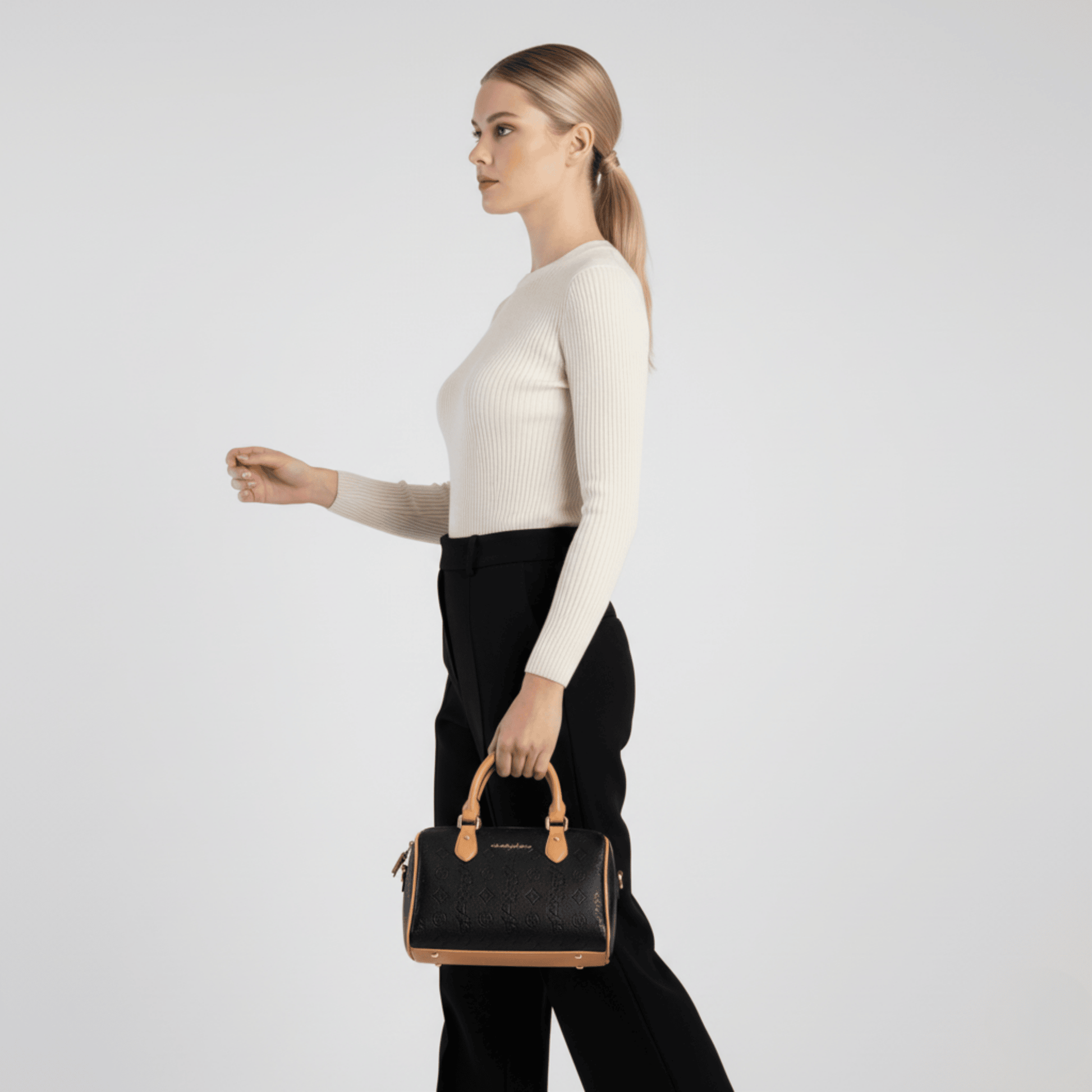 Luxury Sissy Boy women’s handbag with top zip closure and gold-tone accents