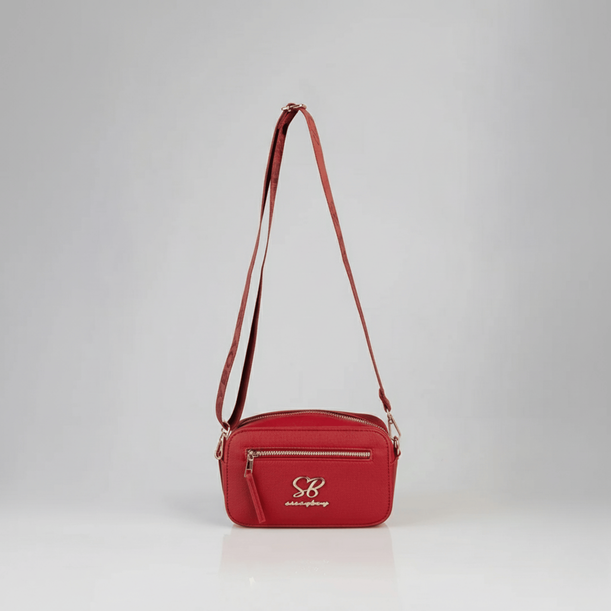 Sissy Boy Basic Camera Crossbody Bag in red with gold detailing