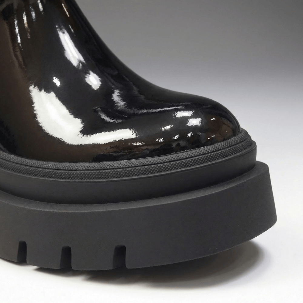 Sissy Boy Alma ankle boots in high-shine black patent with thick treaded platform sole