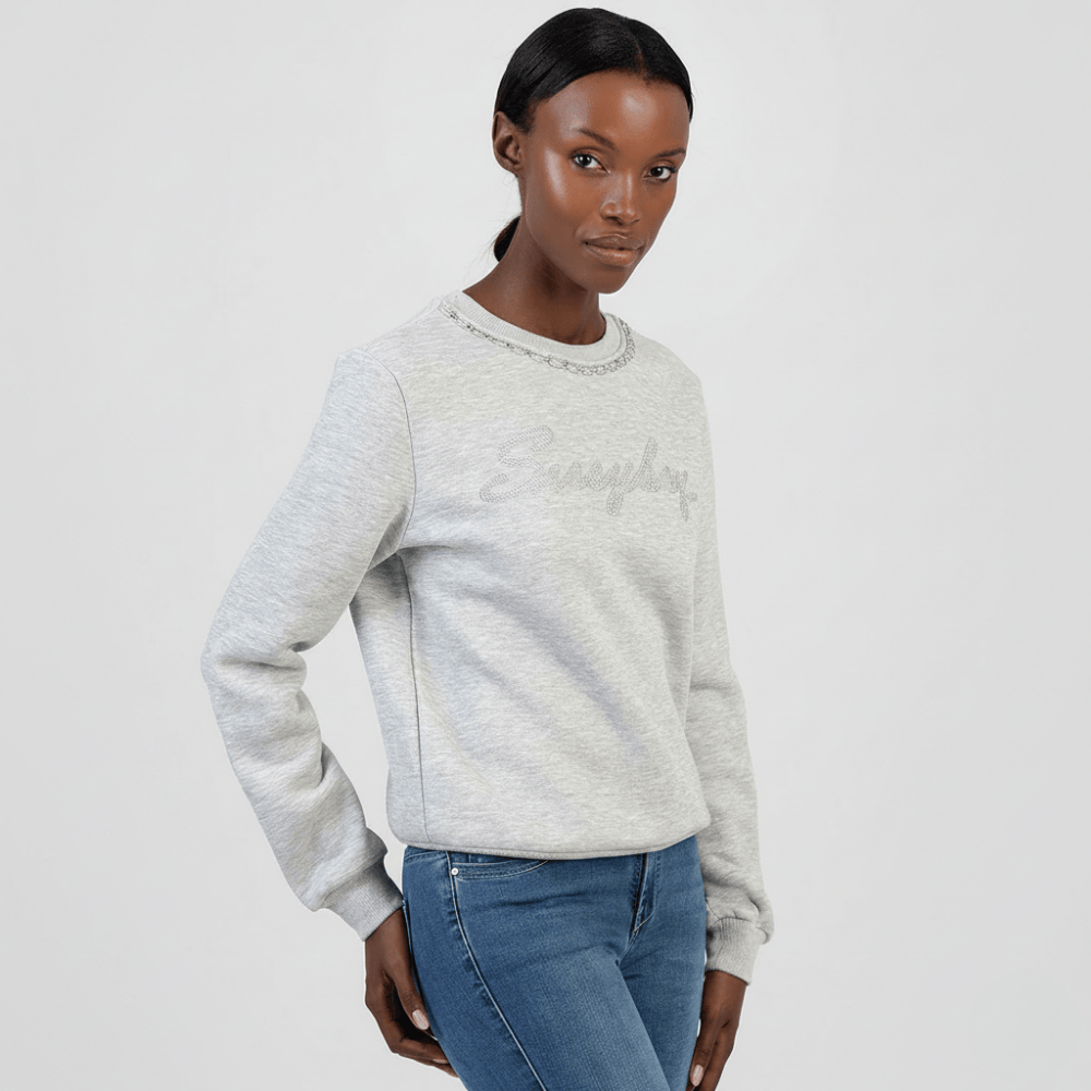 Sissy Boy casual grey sweatshirt paired with denim jeans