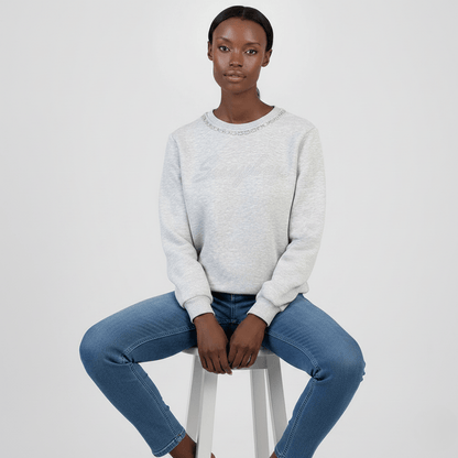 Women’s grey knit sweatshirt with subtle logo detail