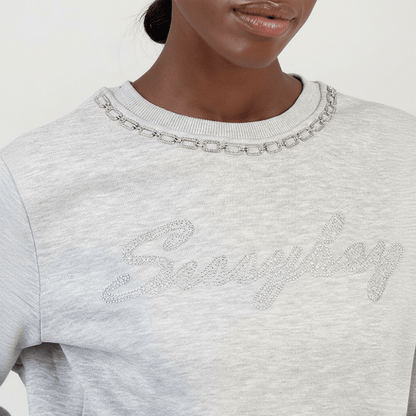 grey sweatshirt neckline and textured fabric