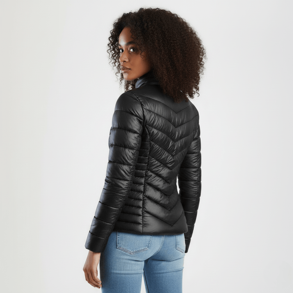 Black fitted puffer jacket for women with diagonal quilting and front zip detail